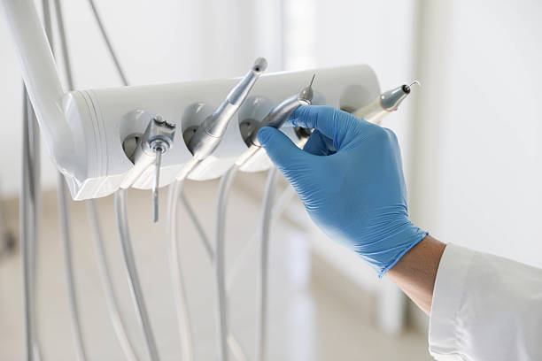 Professional Tooth Extraction technician working in Grundy County County, IA